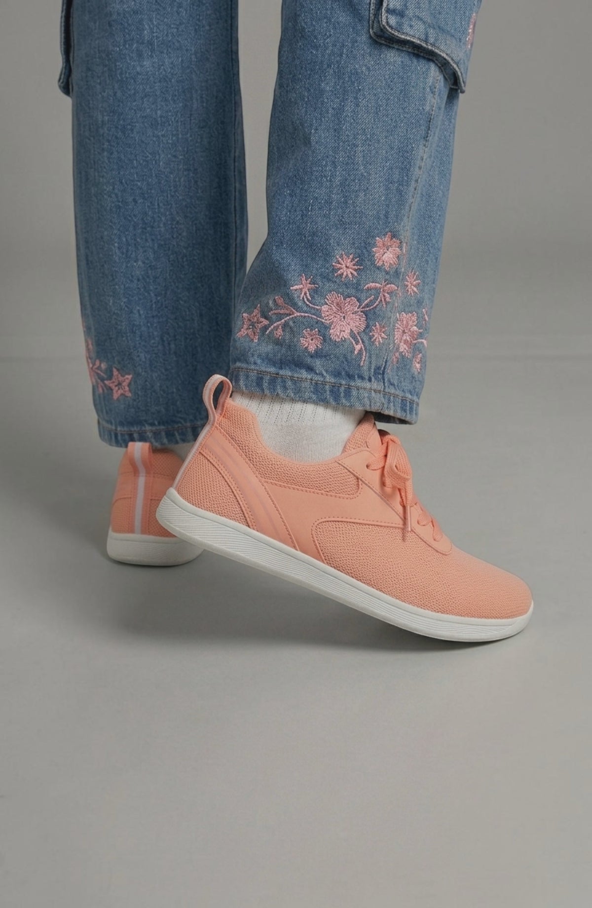 LORVENE Glide Flare Sneakers in white with stylish flare soles, casual athletic design, and lace-up front for comfortable wear.