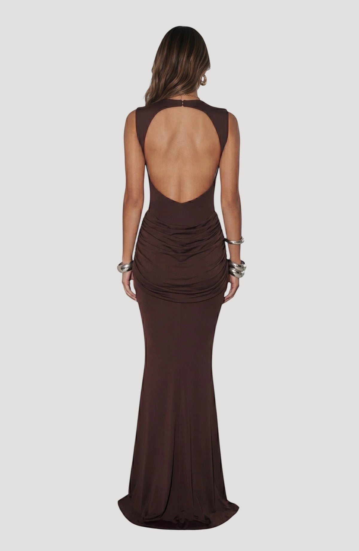 LORVENES Celeste Draped Maxi Gown in flowing fabric with elegant draping and a floor-length silhouette.