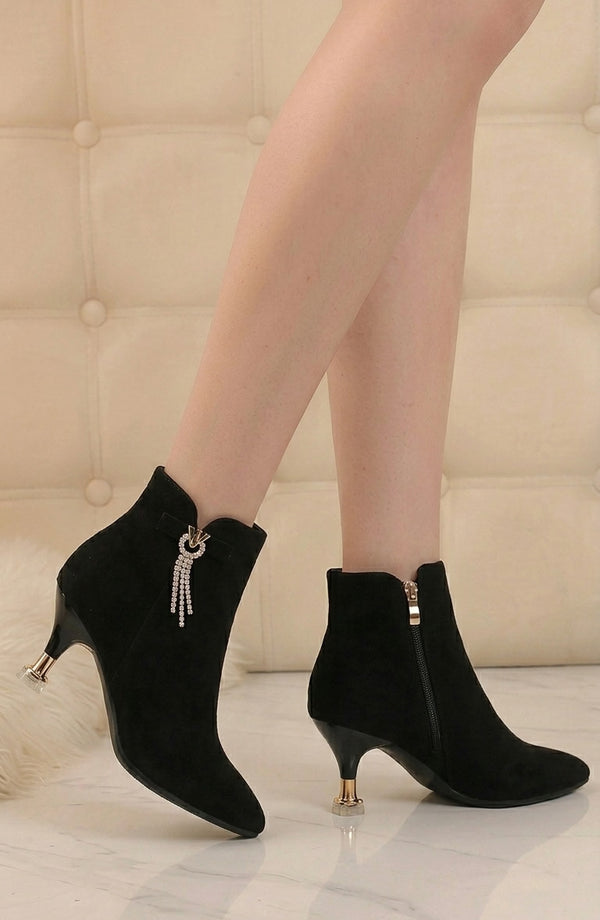 LORVENES elegant stiletto boot with sleek black leather and pointed toe, stylish footwear for formal or evening wear. (600x920)