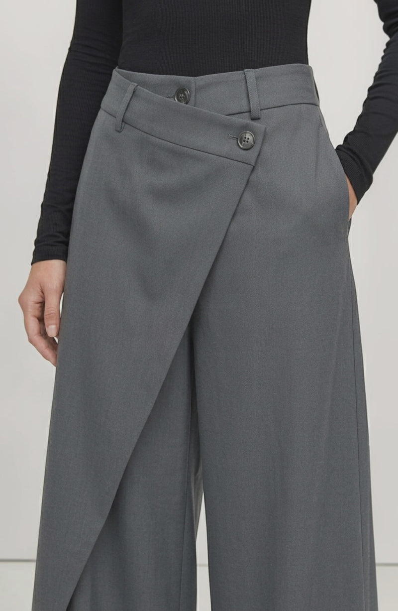LORVENE Curve Form Pants displayed from the bottom left angle, showcasing the fit and fabric texture of the stylish trousers.