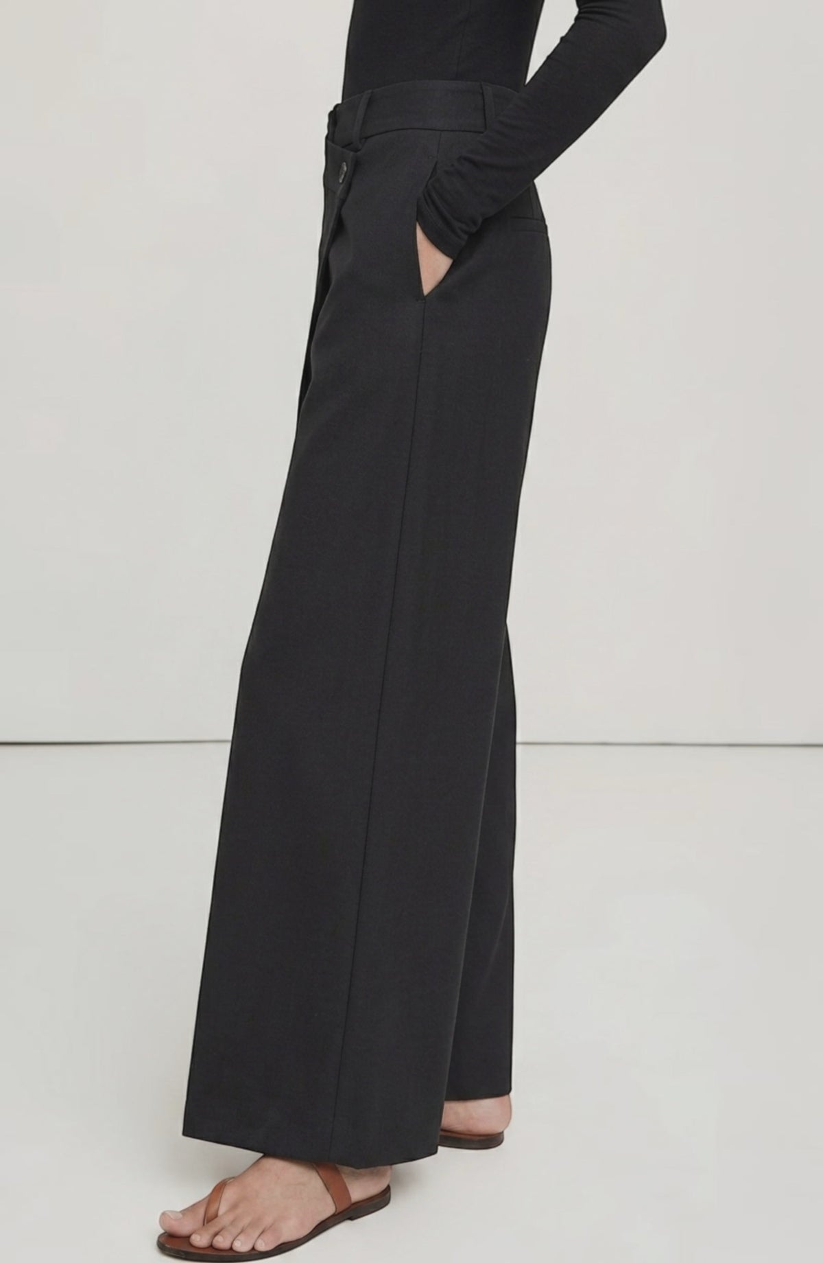 LORVENE Curve Form Pants displayed from the bottom right pose, showcasing the fit and design of the stylish pants.