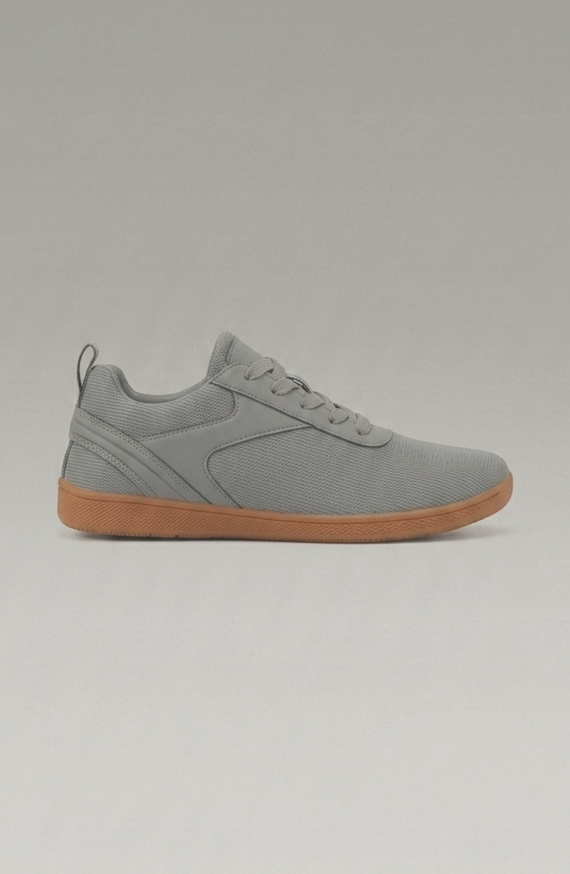 LORVENE Glide Flare Sneakers featuring a sleek design with white laces and a modern silhouette, displayed on a neutral background.