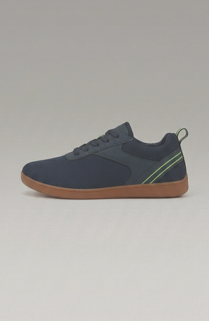 LORVENE Glide Flare Sneakers shown from the bottom left angle, featuring white and beige design with a chunky sole.