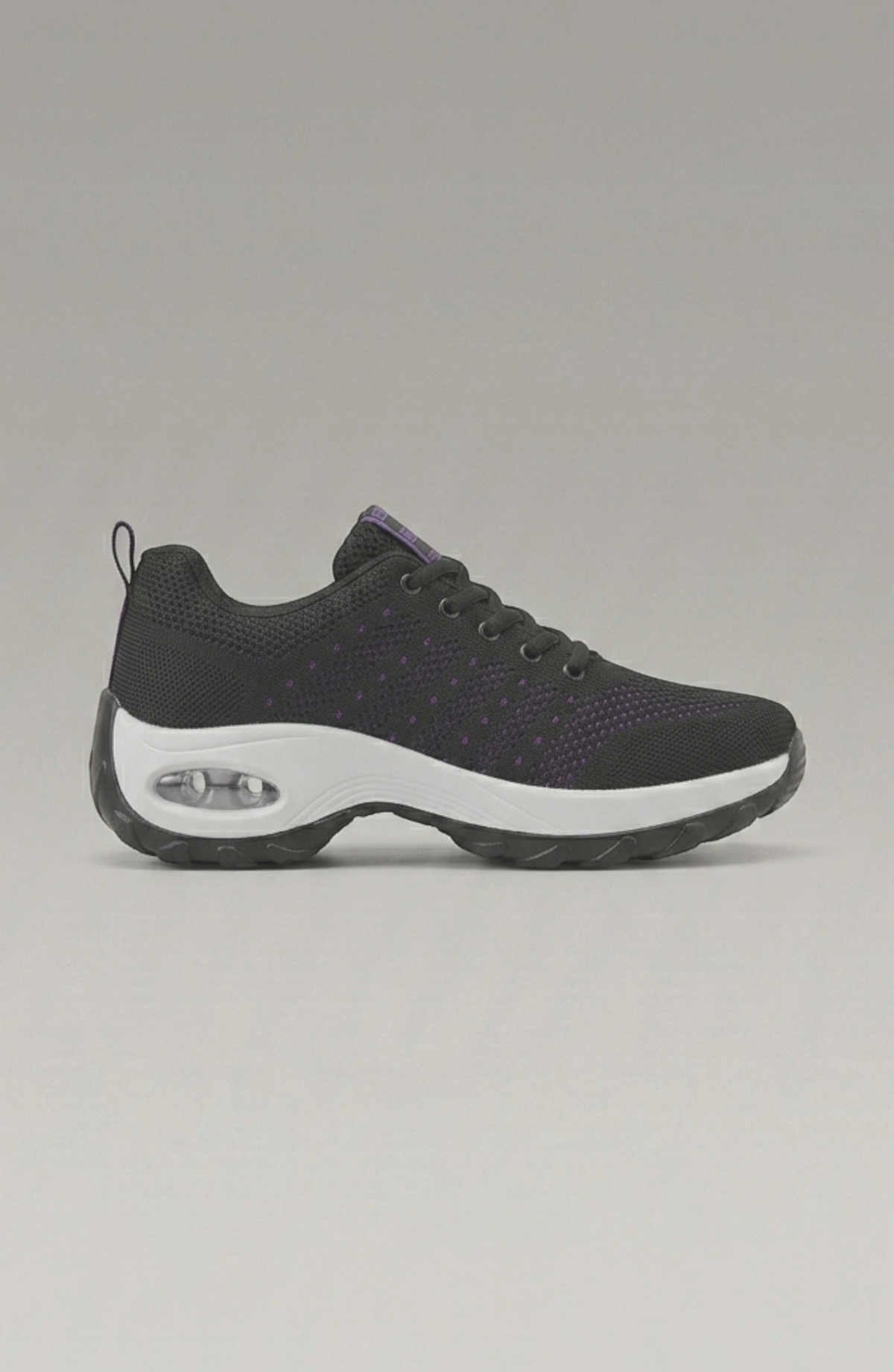 LORVENE Ice Walk Sneakers shown from the bottom left angle, featuring sturdy soles and stylish design for winter outdoor wear.