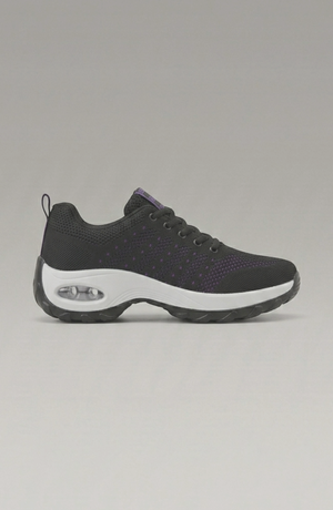 LORVENE Ice Walk Sneakers shown from the bottom left angle, featuring sturdy soles and stylish design for winter outdoor wear.