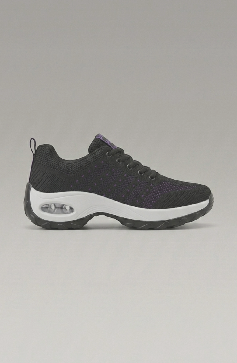 LORVENE Ice Walk Sneakers shown from the bottom left angle, featuring sturdy soles and stylish design for winter outdoor wear.