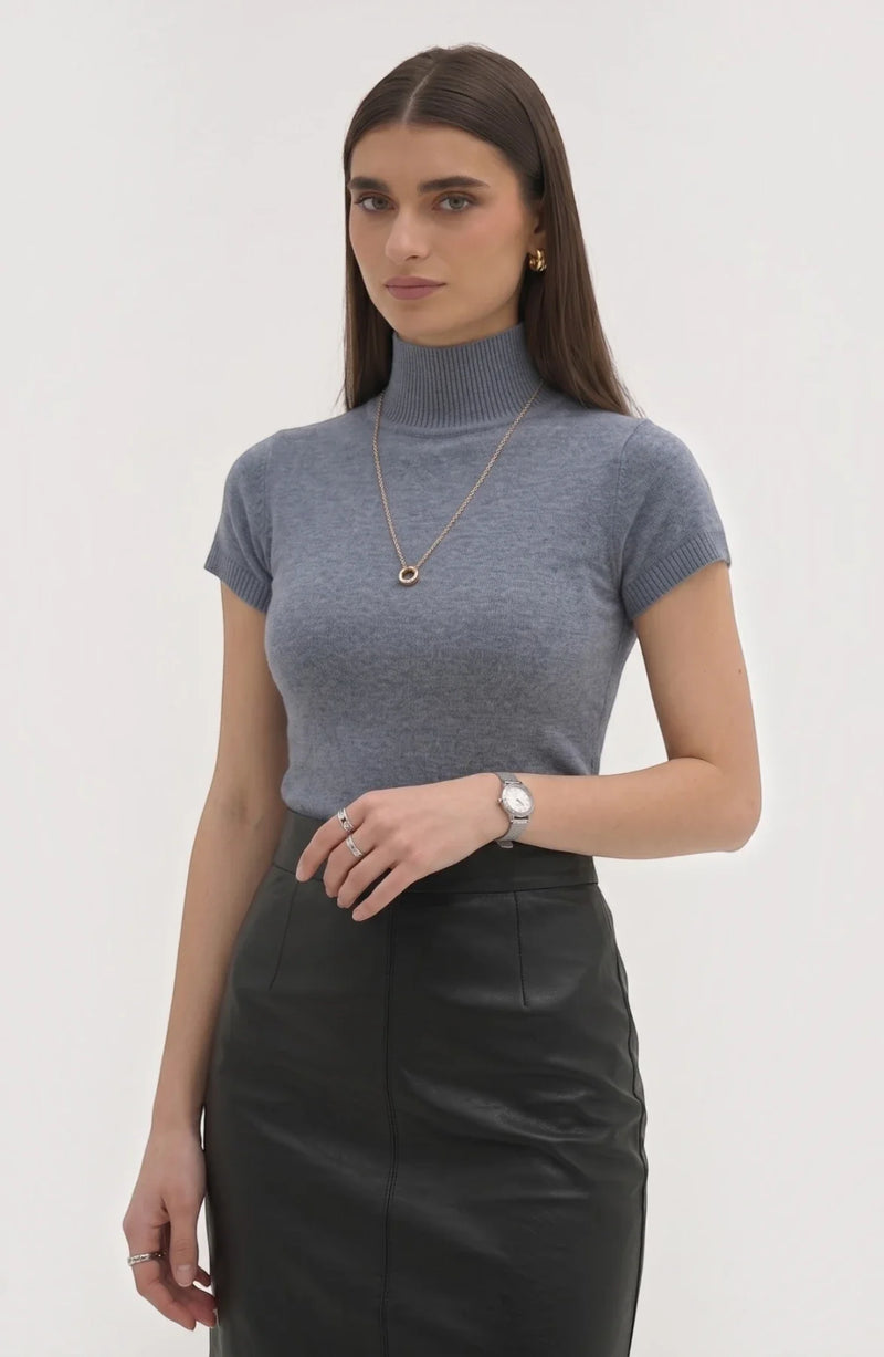 LORVENE Pure Poly Blend High Neck sweater in neutral color, close-up of the soft fabric and high neckline detail.