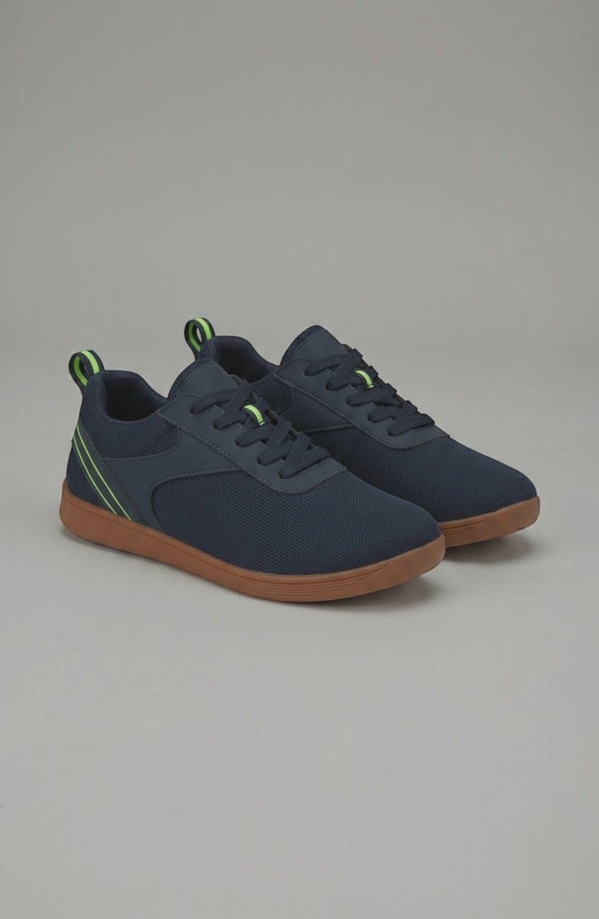 LORVENE Glide Flare Sneakers with white and black design, showcasing stylish casual footwear with flare soles and modern details.