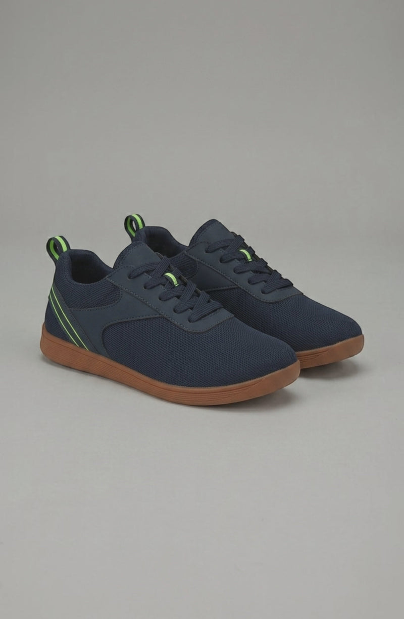 LORVENE Glide Flare Sneakers with white and black design, showcasing stylish casual footwear with flare soles and modern details.