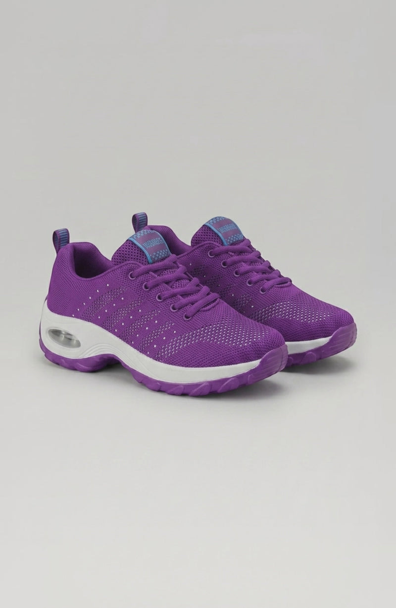 LORVENE Ice Walk sneakers in white with textured soles, designed for winter traction and outdoor walking.