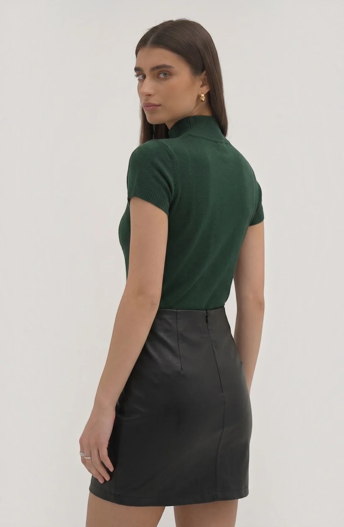 LORVENE pure poly blend high neck sweater, shown in beige with ribbed cuffs and collar, close-up of fabric texture.