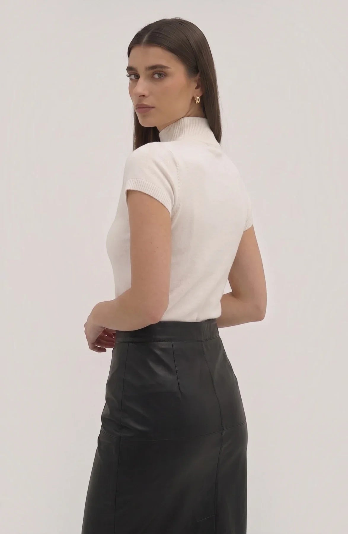 LORVENE pure poly blend high neck top, lightweight fabric with a close-fitting high neckline, shown in the bottom right corner of the image.