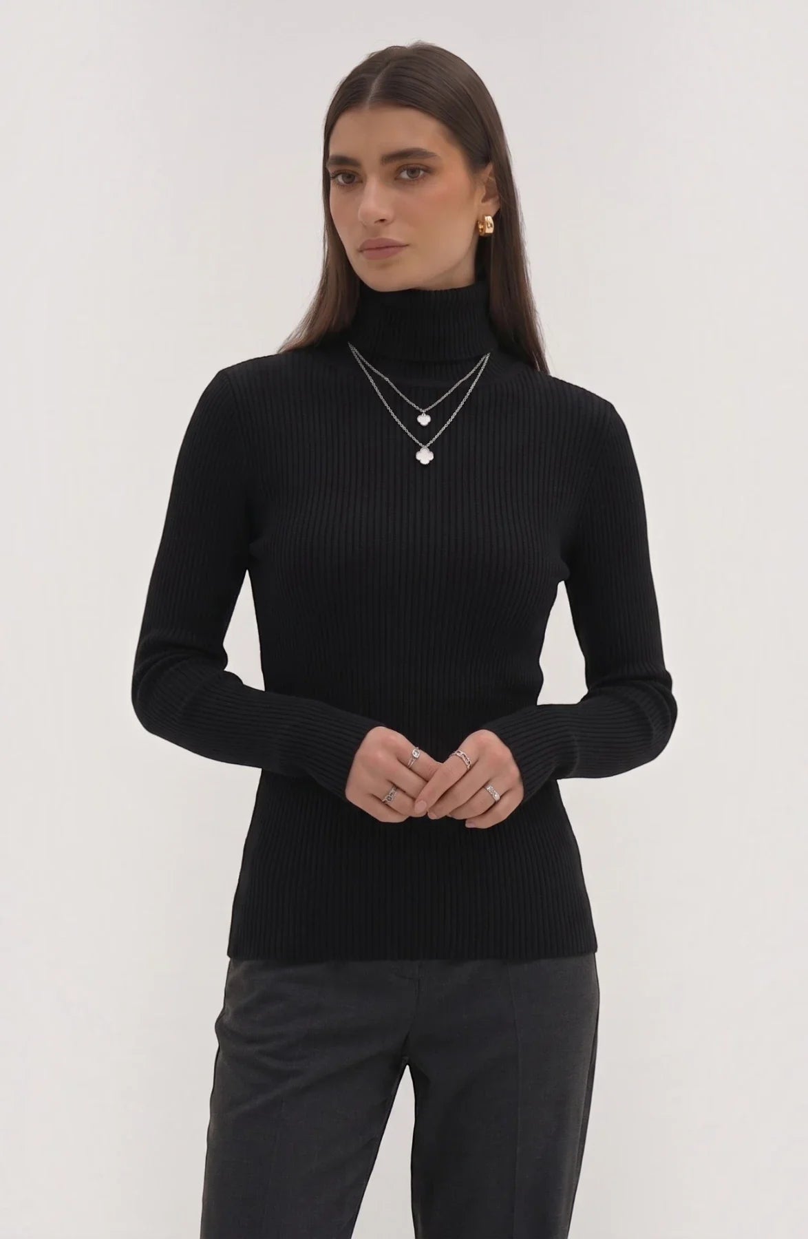 LORVENE pure soft polyester high neck sweater in a neutral color, close-up of the fabric and high neckline detail.