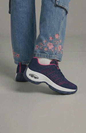LORVENE Ice Walk Sneakers showing side view with textured sole and winter grip design, suitable for cold weather activities.