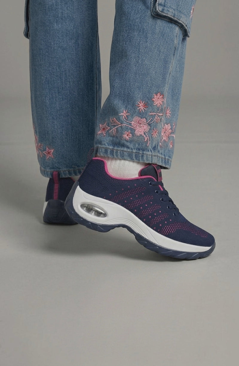 LORVENE Ice Walk Sneakers showing side view with textured sole and winter grip design, suitable for cold weather activities.