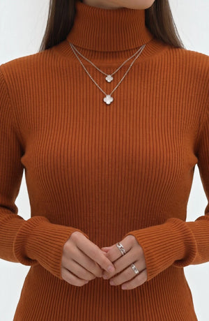 LORVENE Pure Soft Polyester High Neck top in neutral color, close-up view of the smooth fabric and high neckline.
