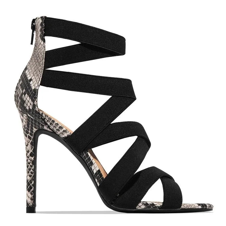 LORVENE Crystal Curve Heels with sparkling embellishments and elegant design, shown on a neutral background.