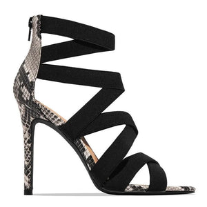 LORVENE Crystal Curve Heels with sparkling embellishments and elegant design, shown on a neutral background.