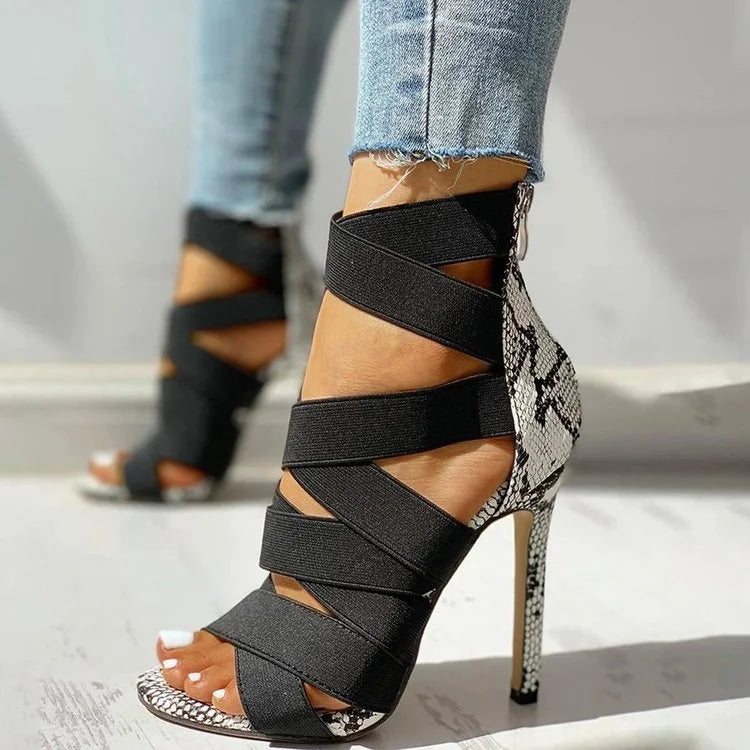 LORVENE Crystal Curve Heels featuring elegant transparent straps and sparkling crystal embellishments for stylish footwear.