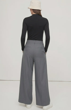 LORVENE Curve Form Pants modeled in a top-right pose, showcasing their sleek fit and modern design.
