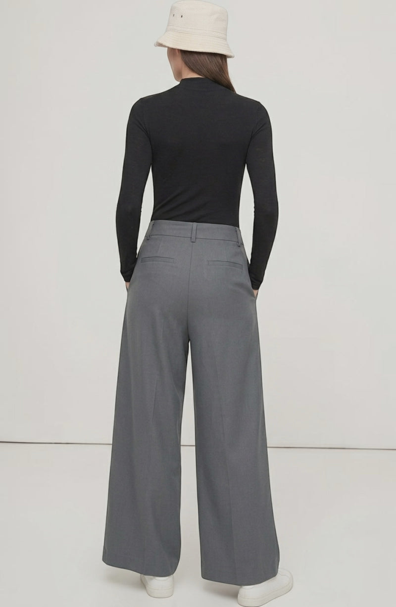 LORVENE Curve Form Pants modeled in a top-right pose, showcasing their sleek fit and modern design.