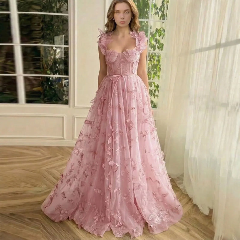 Elegant sleeveless maxi dress by LORVENES featuring a flowing fabric and a fitted waist, perfect for formal occasions.