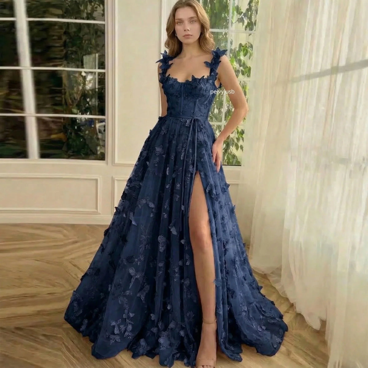 Elegant sleeveless maxi dress by LORVENES featuring flowing fabric and a fitted bodice, perfect for formal occasions.