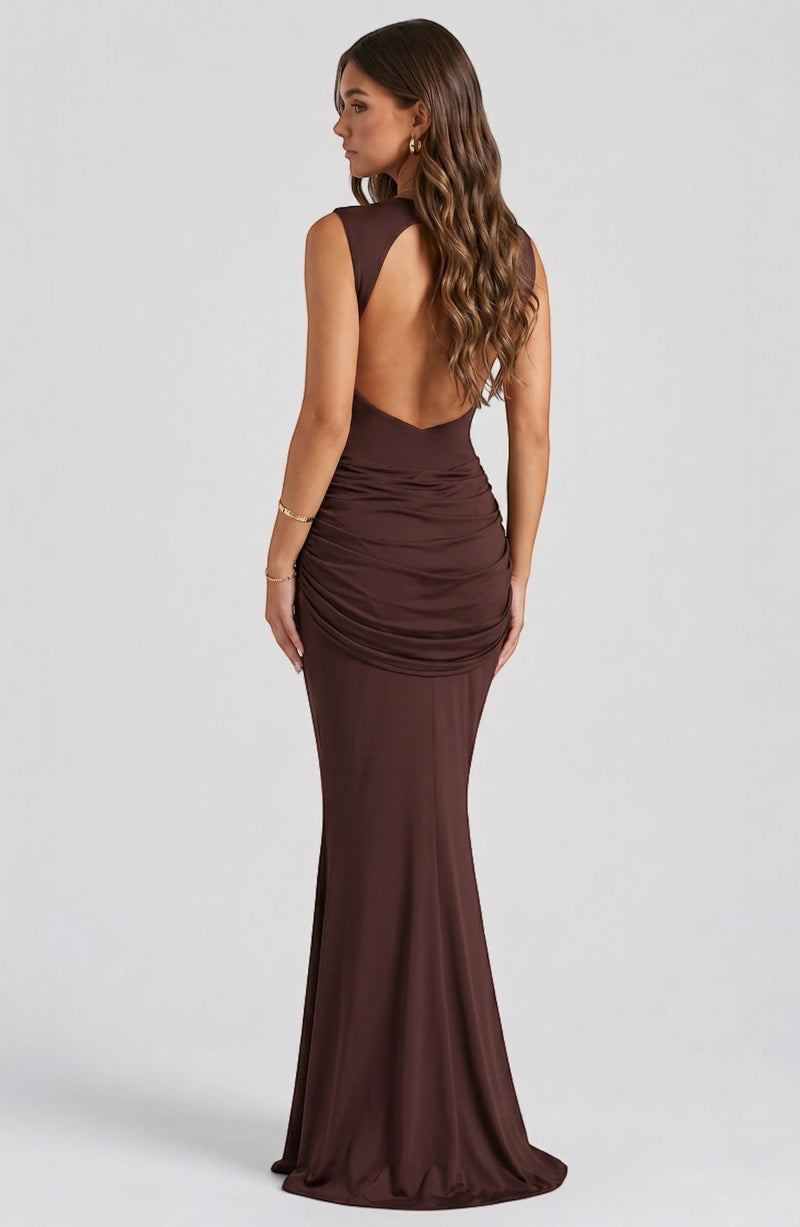 LORVENES Celeste Draped Maxi Gown in flowing fabric with elegant draping and a floor-length silhouette.