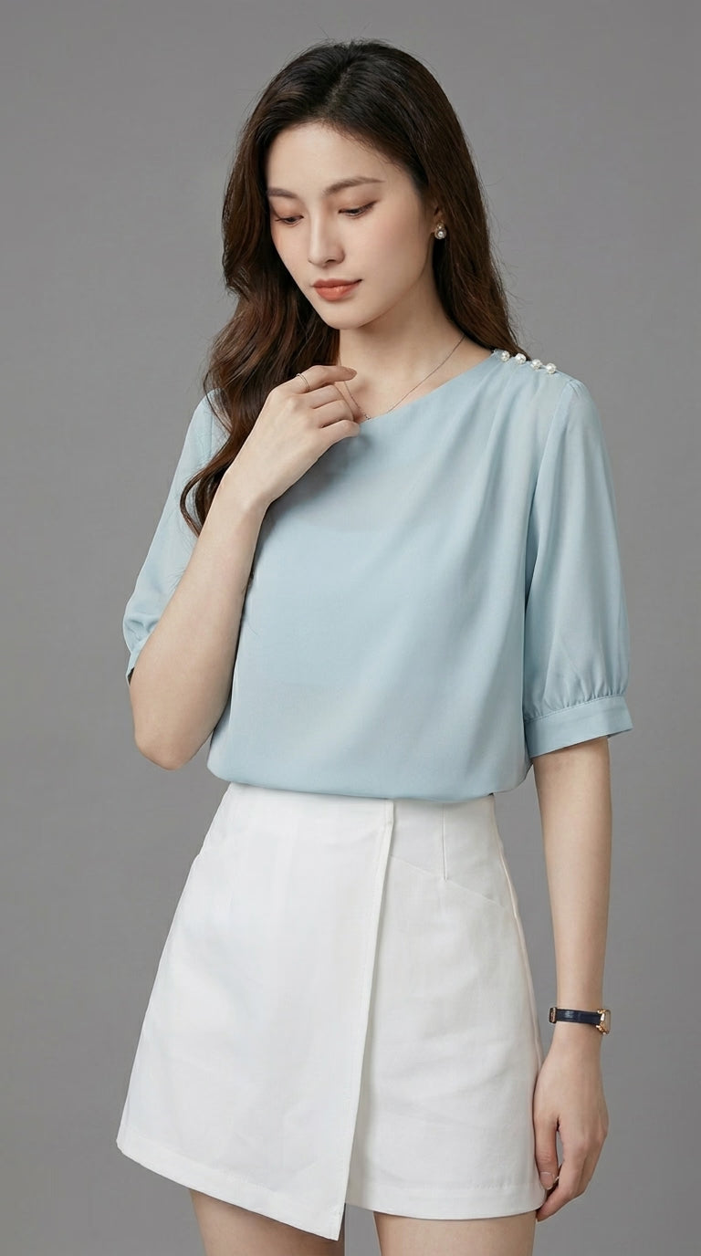 LORVENE chic blouse shirt with long sleeves and button-up front, displayed flat on a neutral background.