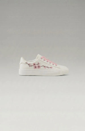 LORVENE Crystal Tone sneakers with clear crystal accents and white rubber soles, stylish casual footwear for everyday wear.
