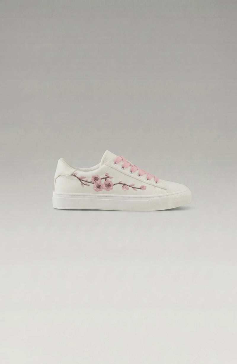 LORVENE Crystal Tone sneakers with clear crystal accents and white rubber soles, stylish casual footwear for everyday wear.
