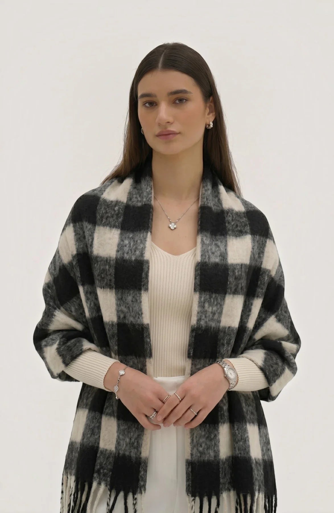 LORVENE lightweight evening shawl draped over a chair, soft fabric in neutral tones, suitable for formal or special occasions.
