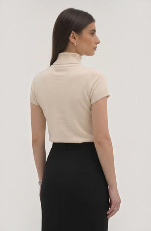 LORVENE Pure Poly Blend High Neck top shown in beige with a close-up of the high neckline and smooth fabric texture.