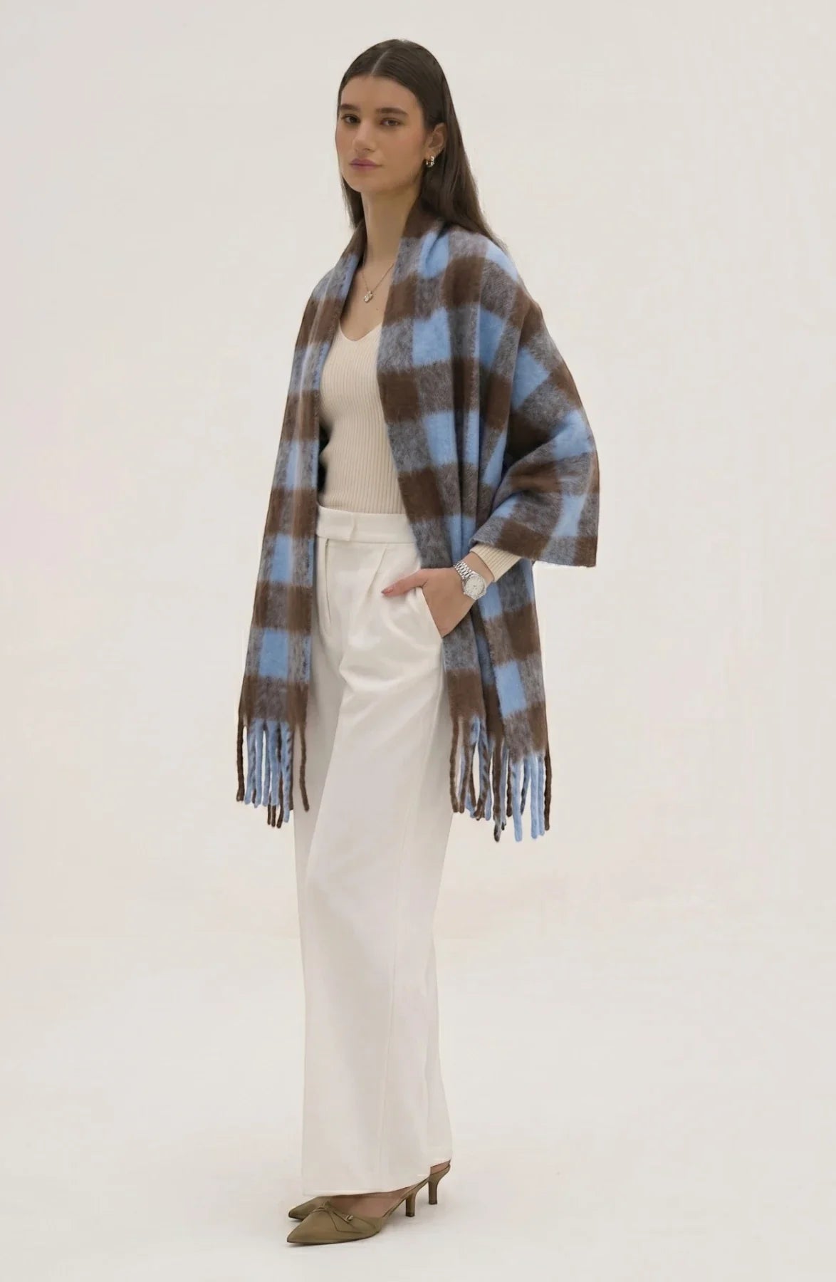 LORVENE lightweight evening shawl draped over a mannequin, showcasing soft fabric and elegant design for formal occasions.