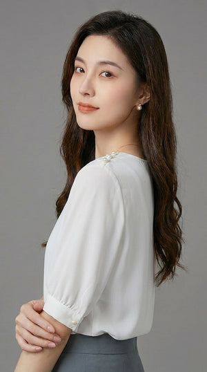 LORVENE chic blouse shirt with a stylish collar and button-down front, featuring a lightweight, elegant fabric.