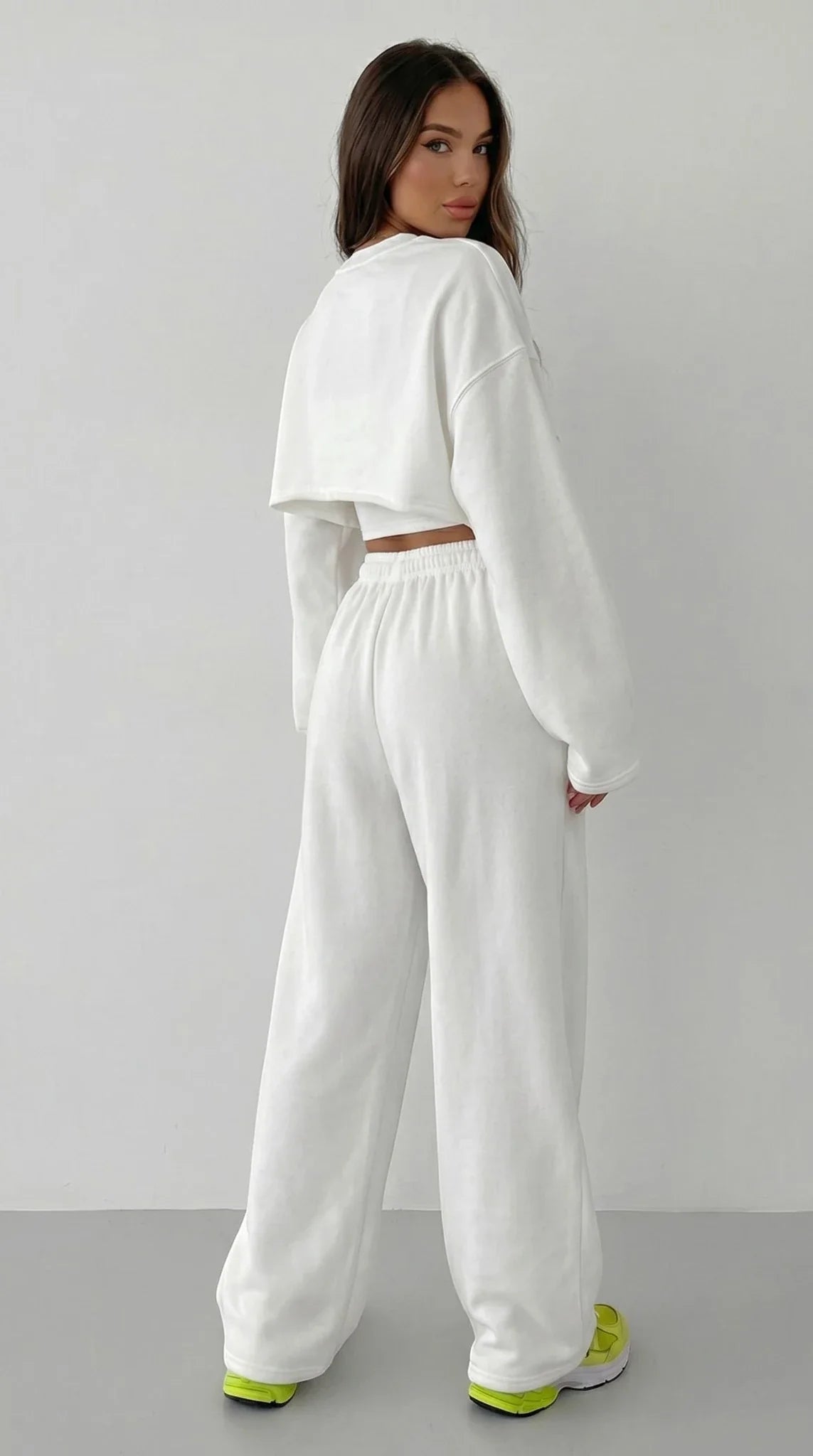 LORVENES women's casual sweater suit with long-sleeved pullover, suspenders, and wide-leg pants in 2023 fashion style.