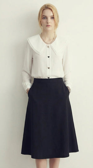 LORVENE Chic Collar Shirt with a stylish collar and tailored fit, displayed on a hanger in a close-up shot.