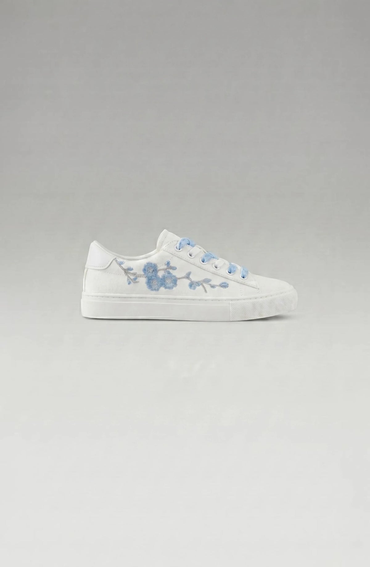 LORVENE Crystal Tone sneakers showing the back view with matching design and crystal accents on a neutral background.