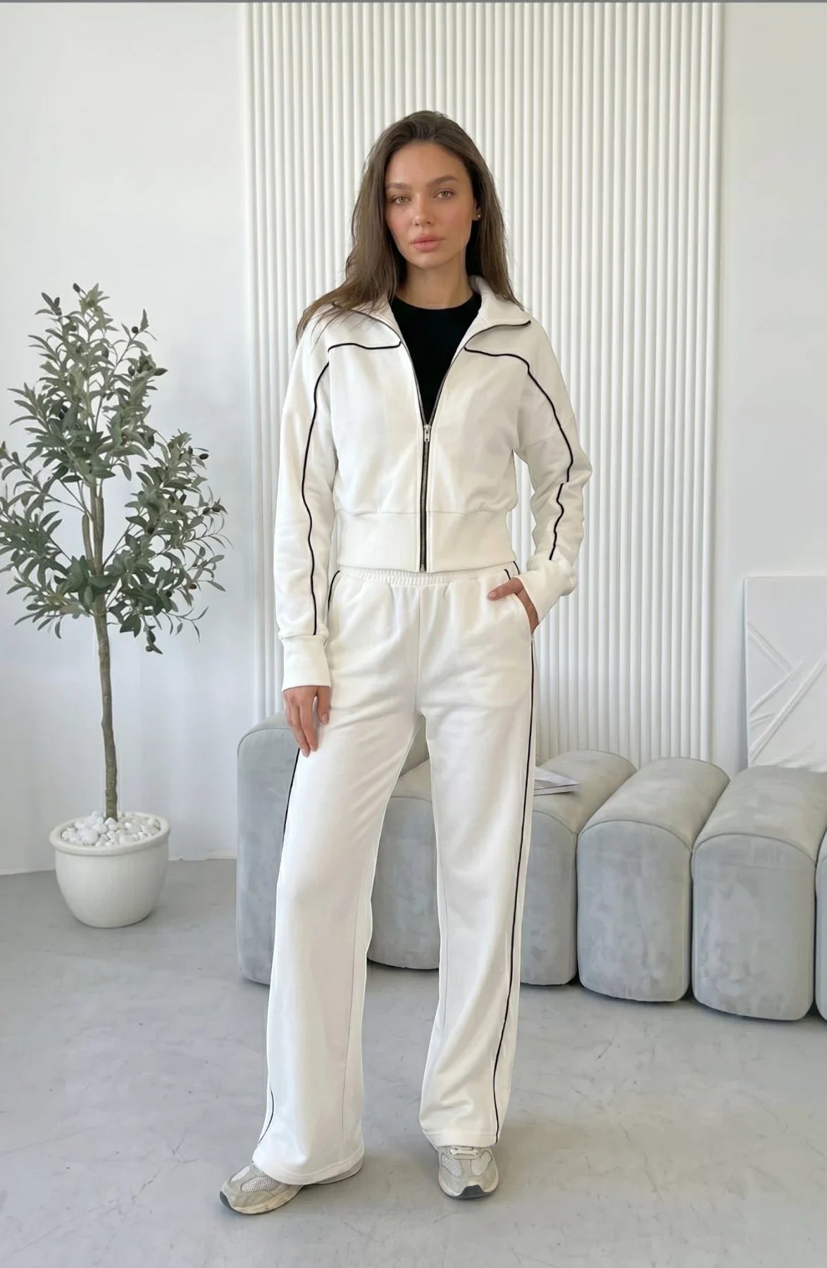 LORVENES striped street cardigan set featuring a cozy knit cardigan and matching pants, worn by a model.