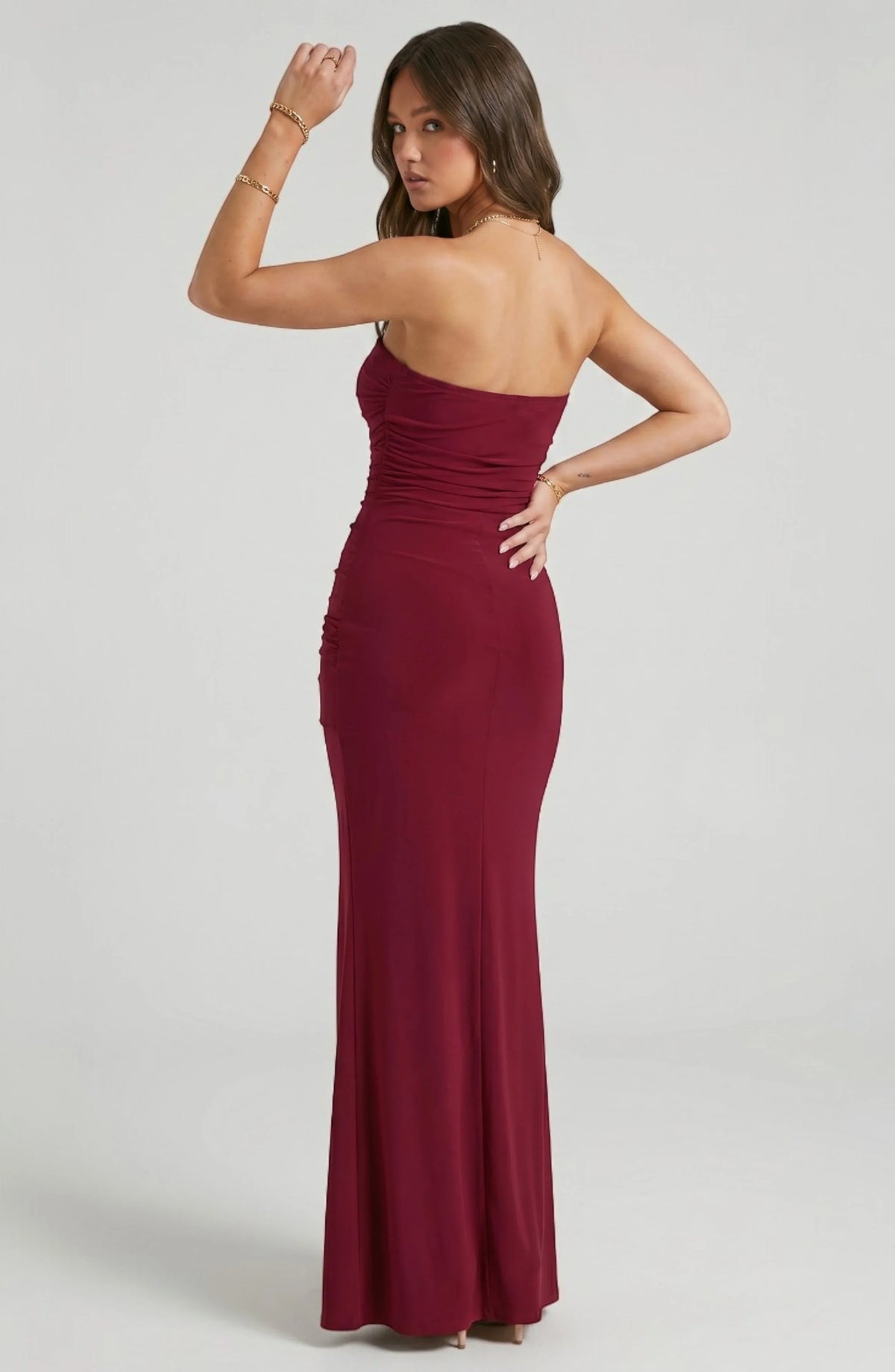 LORVENE Starry Luxe Dress shown from the back, featuring elegant fabric and stylish design perfect for evening wear.