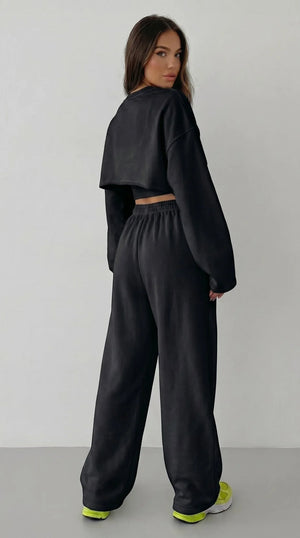 LORVENES women's casual sweater suit featuring a long-sleeved pullover, suspenders, and wide-leg pants in a stylish 2023 fashion look.
