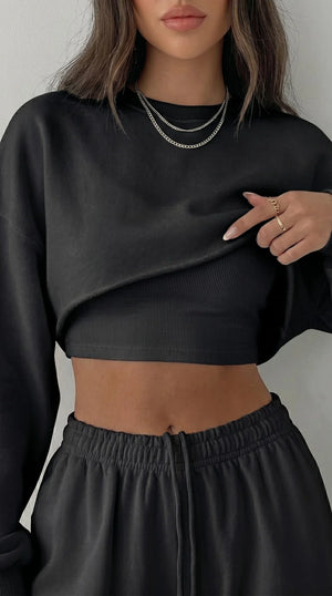 LORVENES women's casual sweater suit with long-sleeved pullover, suspenders, and wide-leg pants in a modern 2023 fashion style.