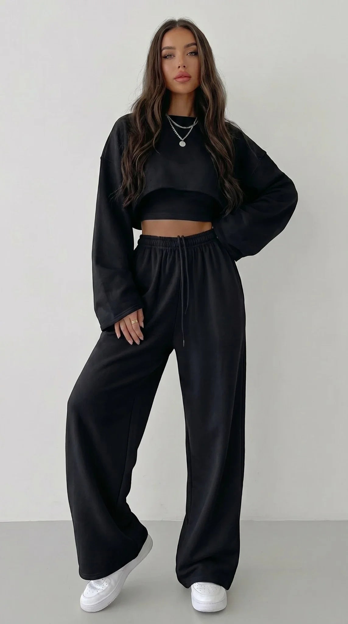 LORVENES women's casual sweater suit with long-sleeved pullover, suspenders, and wide-leg pants, featuring a stylish 2023 fashion look.