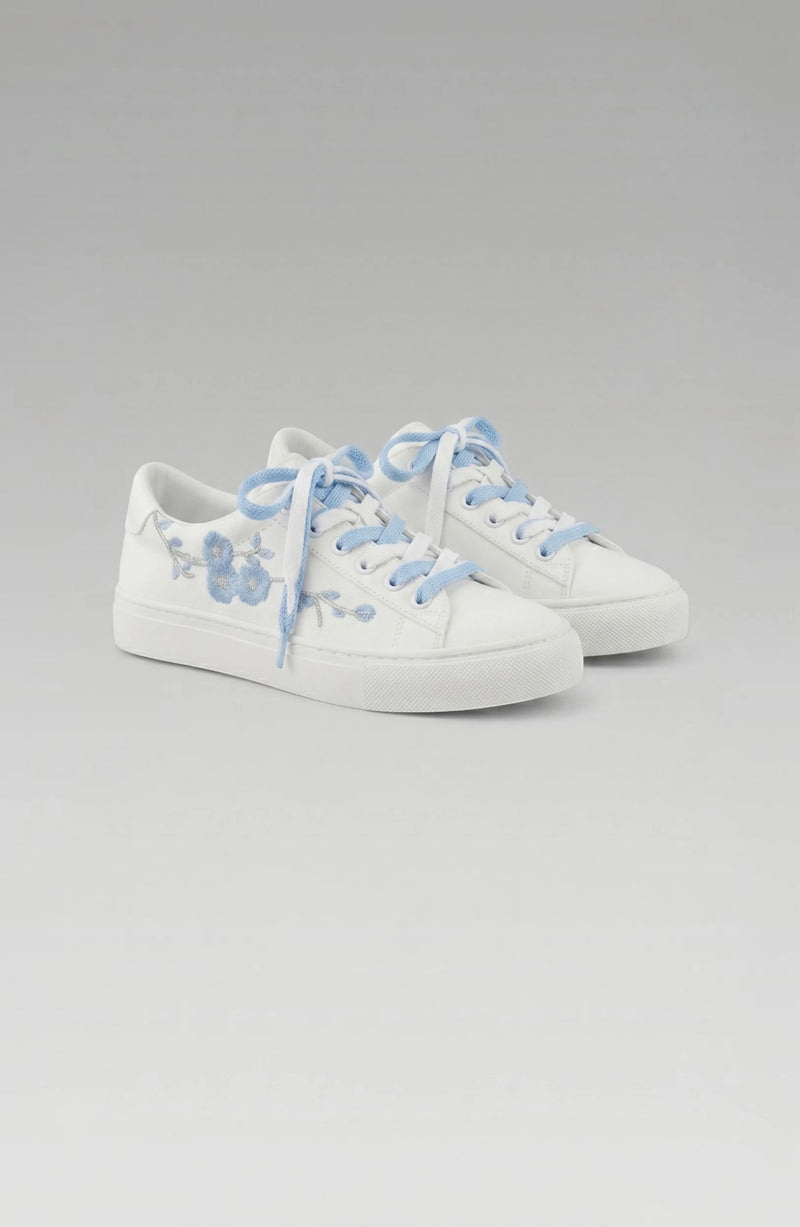 LORVENE Crystal Tone Sneakers featuring clear crystal accents and white athletic soles, stylish and modern footwear.